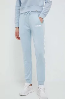 Spodnie damskie - Hummel spodnie dresowe kolor niebieski z nadrukiem - grafika 1