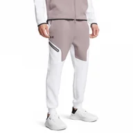 Spodnie sportowe męskie - Męskie spodnie treningowe Under Armour UA Unstoppable Flc Jgr Eu - białe - UNDER ARMOUR - miniaturka - grafika 1
