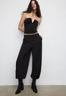 Spodnie damskie - Stradivarius Eleganckie spodnie bufiasty rękaw Czarny 42 - miniaturka - grafika 1