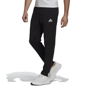 Spodnie dresowe adidas Essentials Tapered GK9222 - czarne - Spodnie sportowe męskie - miniaturka - grafika 1