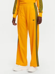 adidas Spodnie dresowe adicolor Classic Firebird JP2316 Żółty Loose Fit - Spodnie sportowe damskie - miniaturka - grafika 1