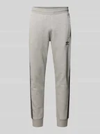 Spodnie sportowe męskie - Spodnie dresowe z elastycznym ściągaczem - miniaturka - grafika 1