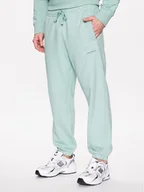 Spodnie sportowe męskie - New Balance Spodnie dresowe MP23551 Zielony Relaxed Fit - miniaturka - grafika 1