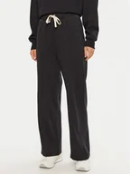 Spodnie sportowe damskie - Champion Spodnie dresowe 117638 Czarny Wide Leg - miniaturka - grafika 1