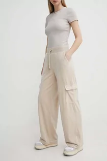 Spodnie damskie - Juicy Couture spodnie dresowe welurowe kolor beżowy z aplikacją - grafika 1