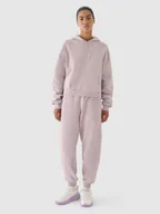 Spodnie sportowe damskie - 4F Spodnie dresowe oversize damskie 4F x Anna Lewandowska - beżowe XS - miniaturka - grafika 1