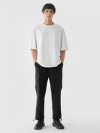 Spodnie męskie - Męskie spodnie materiałowe cargo Outhorn OTHWAW24TTROM0893 - czarne - miniaturka - grafika 1