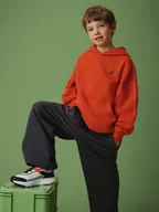 Bluzy dla chłopców - 4F Bluza dresowa loose z kapturem chłopięca - pomarańczowa 158/164 (12-14 lat) - miniaturka - grafika 1