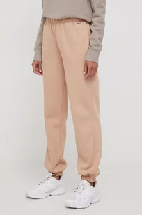 Calvin Klein spodnie dresowe kolor beżowy gładkie - Spodnie damskie - miniaturka - grafika 1