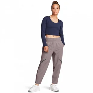 Damskie spodnie treningowe Under Armour Unstoppable Ankle Pant - beżowe - UNDER ARMOUR - Spodnie sportowe damskie - miniaturka - grafika 1