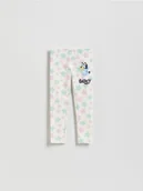 Spodnie i spodenki dla dziewczynek - Reserved - Bawełniane legginsy Bluey - złamana biel - miniaturka - grafika 1