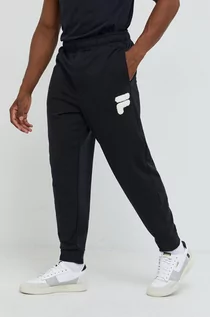 Spodnie męskie - Fila spodnie dresowe męskie kolor czarny z aplikacją - grafika 1