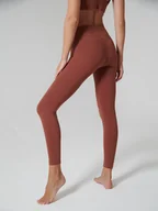 Spodnie sportowe damskie - Onamaste Legginsy sportowe "Suzanna" w kolorze czerwonobrązowym - miniaturka - grafika 1