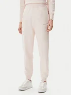 Spodnie sportowe damskie - Calvin Klein Jeans Spodnie dresowe Monologo J20J225354 Różowy Slim Fit - miniaturka - grafika 1