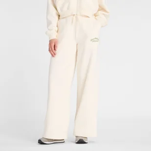 Spodnie damskie New Balance WP53902PEF beżowe - Spodnie sportowe damskie - miniaturka - grafika 1