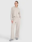 Spodnie sportowe damskie - 4F Spodnie dresowe z modalem z szerokimi nogawkami damskie - beżowe M - miniaturka - grafika 1