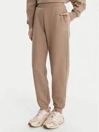 Spodnie sportowe damskie - Guess Spodnie dresowe V6RB15 K9V31 Beżowy Regular Fit - miniaturka - grafika 1