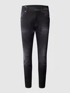Spodnie męskie - Jeansy o kroju skinny fit z naszywką z logo - miniaturka - grafika 1