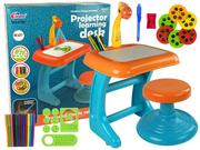 Zabawki interaktywne dla dzieci - Import leantoys leantoys LEANToys Stolik Tablica Do Rysowania Krzesełko Projektor Pomarańczowy Pisaki Obrazki 9498 - miniaturka - grafika 1