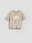 Bluzki dla niemowląt - Reserved - Bawełniany t-shirt - kremowy - miniaturka - grafika 1