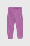Spodnie i spodenki dla dziewczynek - Calvin Klein Jeans spodnie dresowe dziecięce kolor fioletowy gładkie - miniaturka - grafika 1