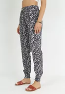 Spodnie damskie - Granatowe Spodnie w Kwiaty z Gumką w Pasie Lorraina - miniaturka - grafika 1