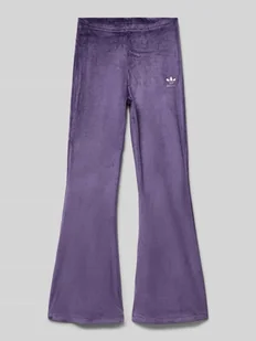 Spodnie materiałowe o rozkloszowanym kroju z elastycznym pasem - Spodnie i spodenki dla chłopców - miniaturka - grafika 1