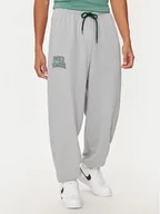 Spodnie sportowe męskie - Under Armour Spodnie dresowe UA Icon 1386551 Szary Loose Fit - miniaturka - grafika 1