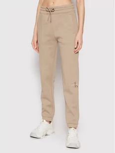 Calvin Klein Jeans Spodnie dresowe J20J216240 Beżowy Regular Fit - Spodnie sportowe damskie - miniaturka - grafika 1