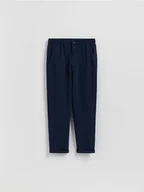 Spodnie i spodenki dla chłopców - Reserved - BOYS` TROUSERS - granatowy - miniaturka - grafika 1