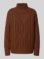 Swetry damskie - Sweter wełniany o kroju oversized ze ściegiem warkoczowym i prążkowaną stójką - miniaturka - grafika 1