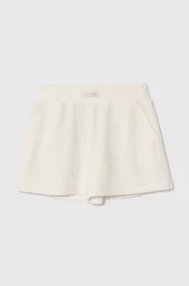 Spodnie i spodenki dla dziewczynek - Guess szorty dziecięce kolor beżowy gładkie - grafika 1