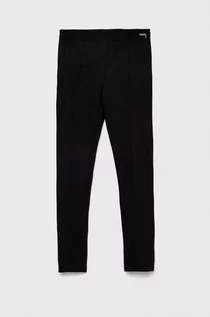 Spodnie i spodenki dla dziewczynek - Guess legginsy dziecięce kolor czarny gładkie - grafika 1