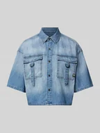 Bluzki damskie - Bluzka jeansowa o kroju relaxed fit z kieszeniami na piersi - miniaturka - grafika 1