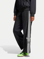 Spodnie sportowe damskie - adidas Spodnie dresowe adicolor Adibreak JD0857 Czarny Loose Fit - miniaturka - grafika 1