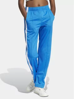 Dresy damskie - adidas Spodnie dresowe Adibreak IP0615 Niebieski Regular Fit - grafika 1