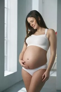 Biustonosze ciążowe - Medela, Eva, Biustonosz bezszwowy dla kobiet w ciąży i karmiących piersią, rozmiar S, Biały - grafika 1