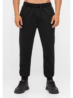 Spodnie sportowe męskie - Bench Spodnie dresowe "Sully" w kolorze czarnym - grafika 1