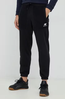 Spodnie męskie - New Balance spodnie dresowe męskie kolor czarny z aplikacją - grafika 1