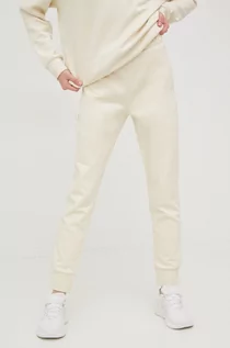 Spodnie damskie - Outhorn spodnie dresowe damskie kolor beżowy gładkie - grafika 1