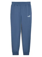 Spodnie sportowe męskie - Puma Spodnie dresowe w kolorze niebieskim - miniaturka - grafika 1