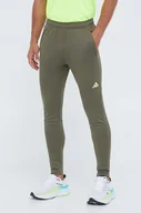 Spodnie męskie - adidas Performance spodnie treningowe Train Essentials Seasonal kolor zielony z nadrukiem - miniaturka - grafika 1