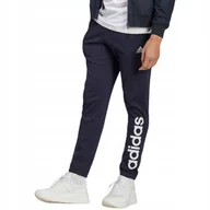 Dresy męskie - Spodnie męskie adidas Essentials Single Jersey Tapered Elasticized Cuff Log - miniaturka - grafika 1