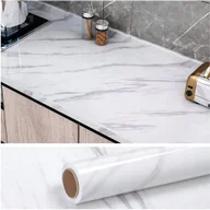Meble modułowe i akcesoria - SAMOPRZYLEPNA MEBLOWA OKLEINA NA MEBLE FOLIA BIAŁY MARMUR 60cm x 10m - miniaturka - grafika 1