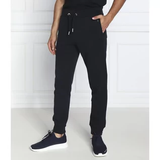 Spodnie męskie - Superdry Spodnie dresowe | Regular Fit - grafika 1