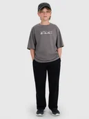 Spodnie i spodenki dla chłopców - 4F Spodnie dresowe chłopięce - czarne 122 (6-7 lat) - miniaturka - grafika 1