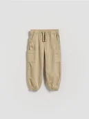 Spodenki dla niemowląt - Reserved - Wysokoelastyczne joggery cargo - beżowy - miniaturka - grafika 1
