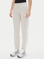 Spodnie sportowe damskie - adidas Spodnie dresowe Tricot 3-Stripes JD4536 Beżowy Regular Fit - miniaturka - grafika 1