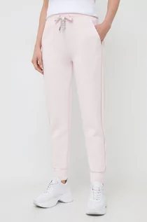 Spodnie damskie - Guess spodnie dresowe kolor różowy z aplikacją - grafika 1