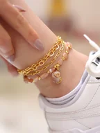 Bransoletki - L'Atelier de Gaia Pozłacana bransoletka z kamieniami szlachetnymi na kostkę - miniaturka - grafika 1